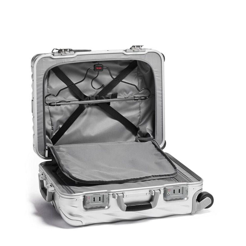 Silver suitcase with open lid on a white background