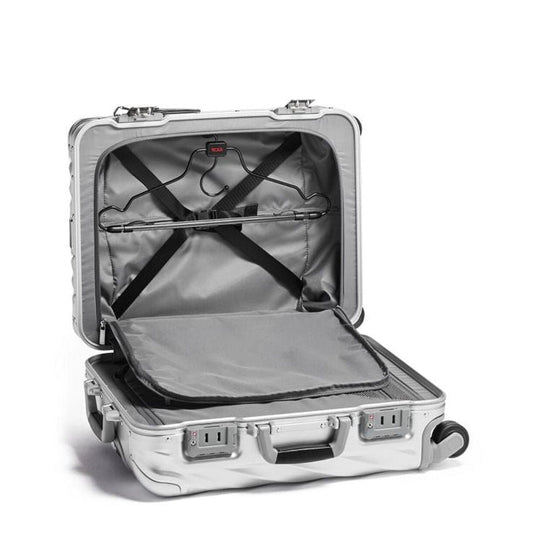 Silver suitcase with open lid on a white background