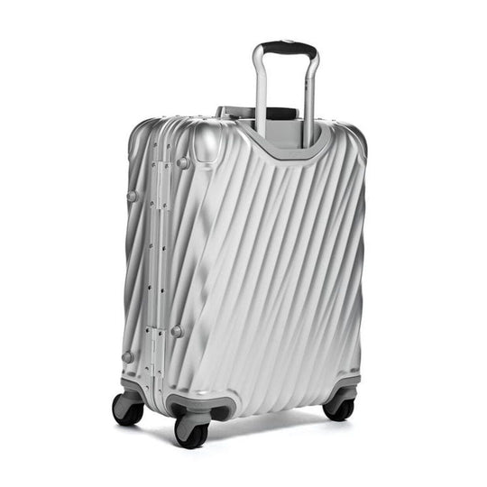 Silver suitcase with a handle on a white background
