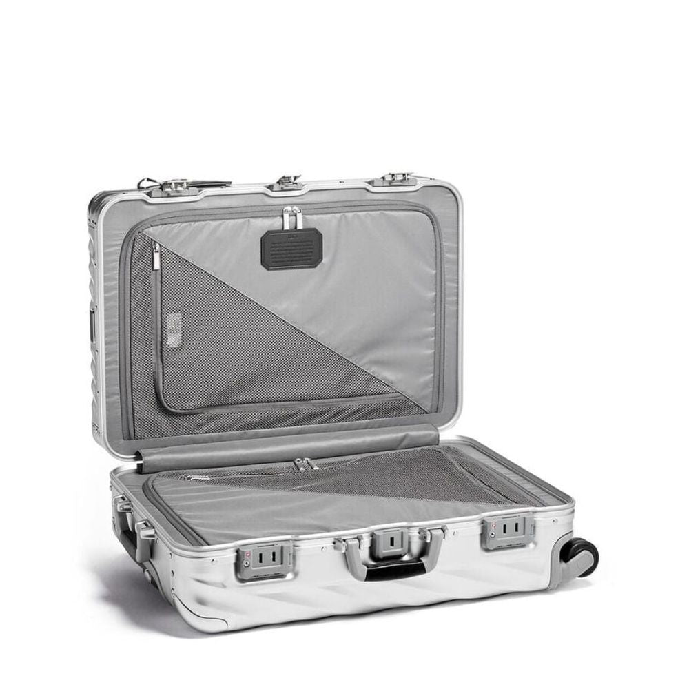 Silver suitcase with open lid on a white background