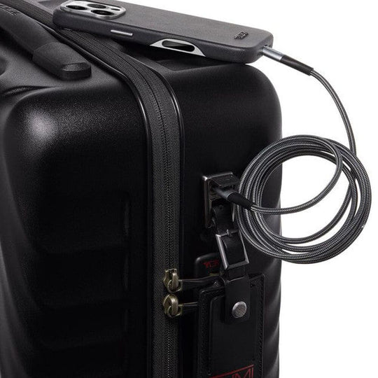 Mobile being charged via USB Port of TUMI 19 Degree Compact Carry-On 155374-6153 in Black Texture 