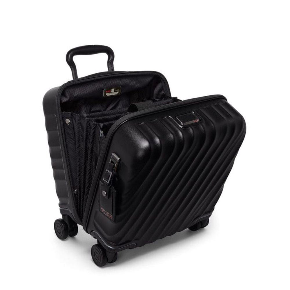 Black suitcase with open compartment on a white background