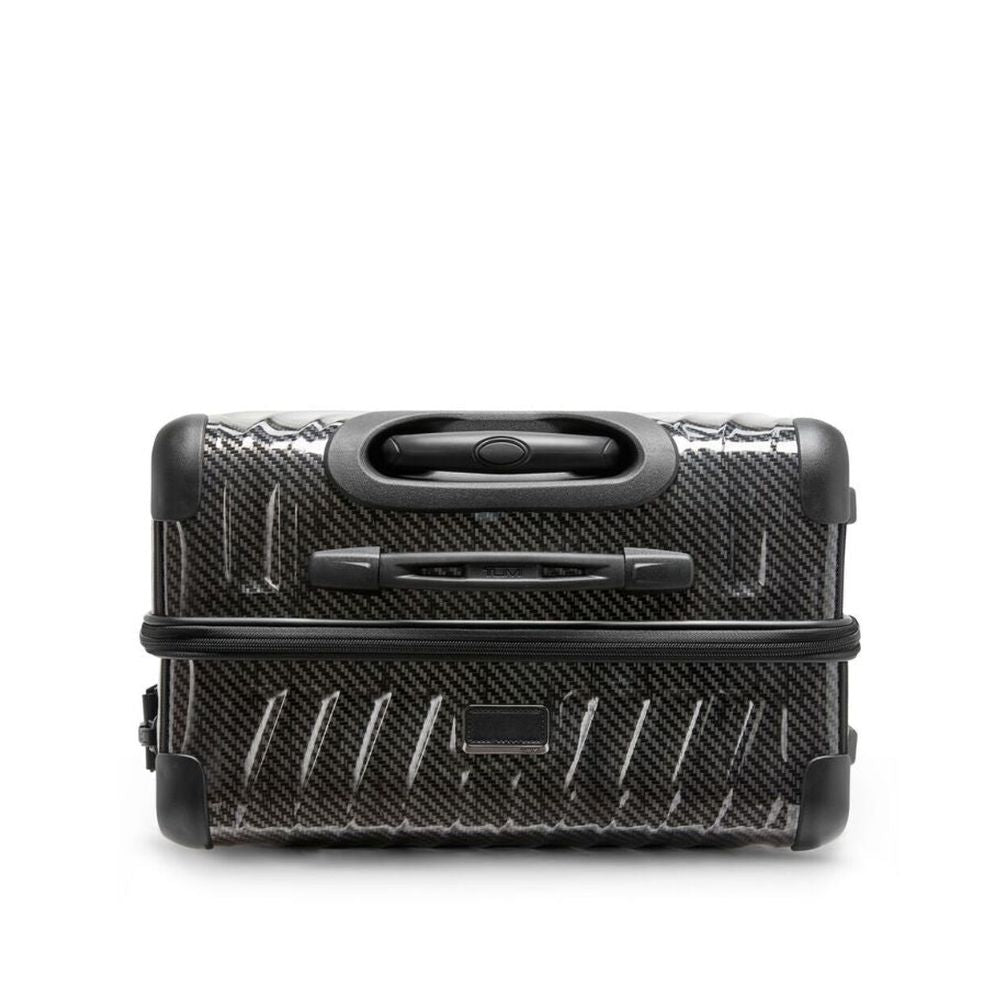 Black suitcase with carbon fiber pattern on a white background