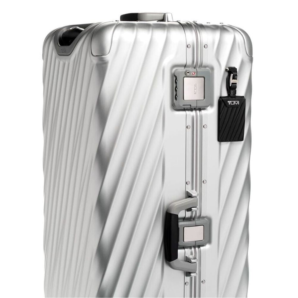 Close up of the combination lock and handle on TUMI 19 Degree Rolling Trunk: Model 135598-1776