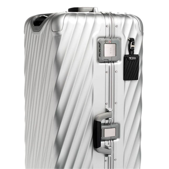 Close up of the combination lock and handle on TUMI 19 Degree Rolling Trunk: Model 135598-1776