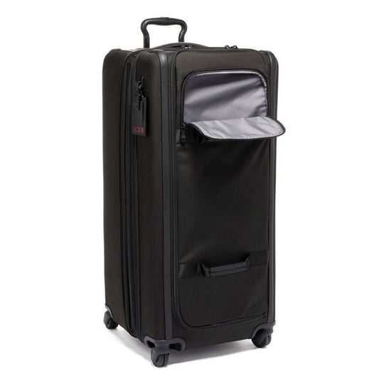 Black suitcase with open compartment on a white background