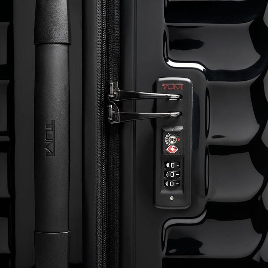 Close up of the combination lock and handle on TUMI Iconic Alpha 3 Packing Case: Model Number 139686-1596

