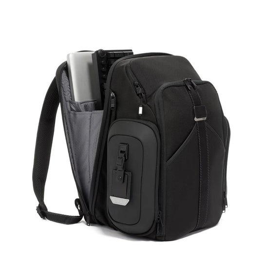 Black backpack with multiple compartments on a white background