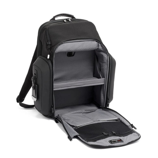 Black backpack with open compartment on a white background