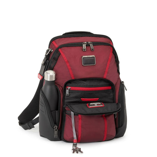 Red and black backpack with water bottle on a white background
