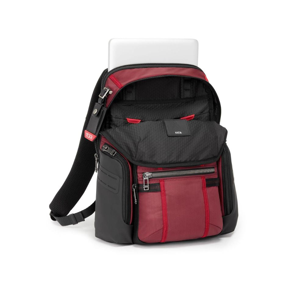 Red and black backpack with a laptop compartment on a white background