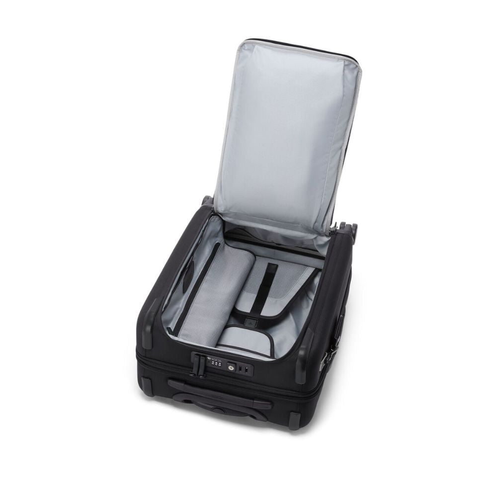 Black suitcase with open lid on a white background
