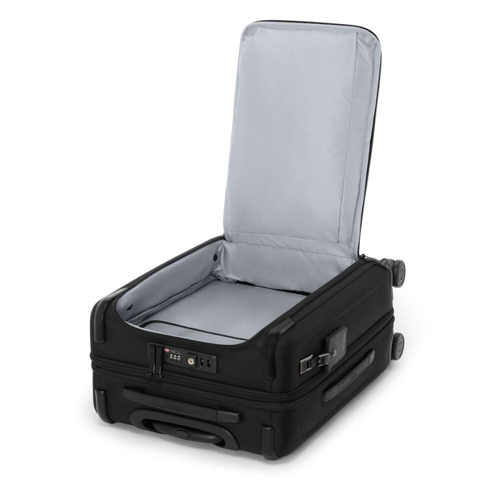 Black suitcase with open lid on a white background