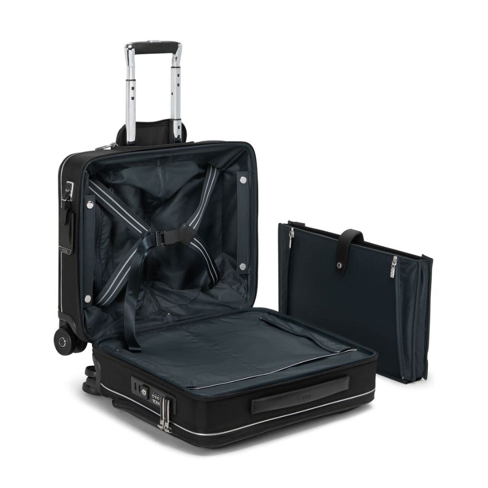 Black suitcase with open lid and a black folder on a white background