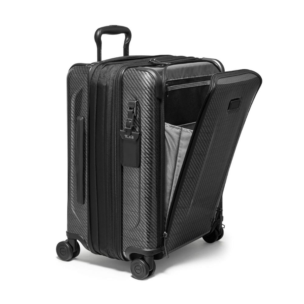 Black suitcase with open compartment on a white background