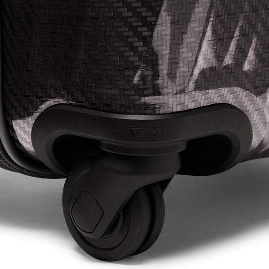 Close-up of a suitcase wheel with a textured surface