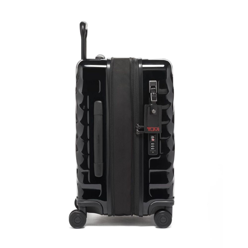 Black suitcase with wheels and handle on a white background