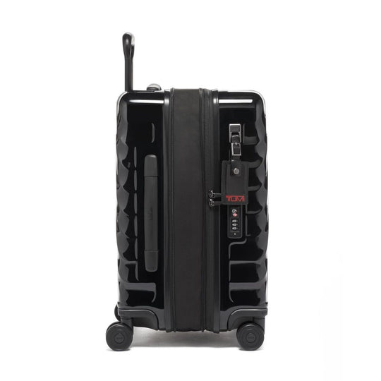 Black suitcase with wheels and handle on a white background
