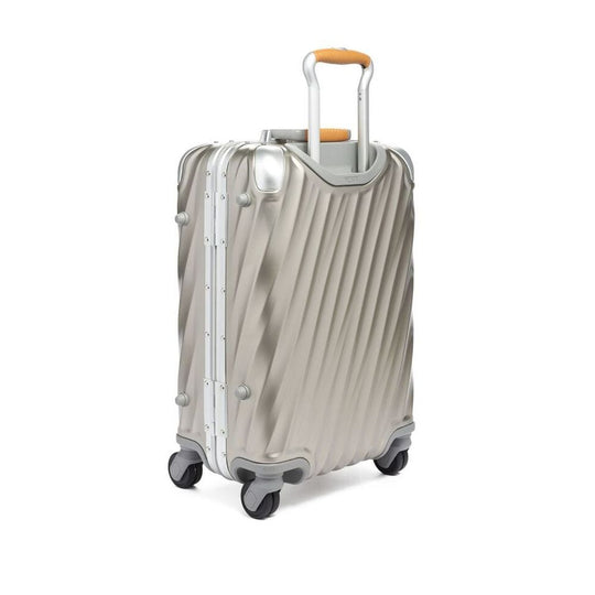 Beige suitcase with a white background