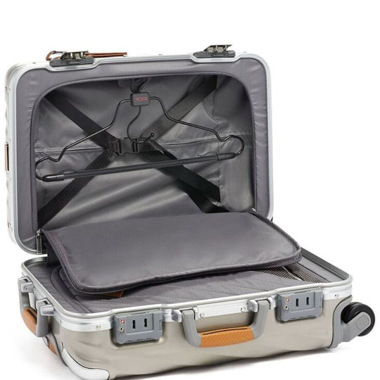 Open suitcase with interior organization system on a white background