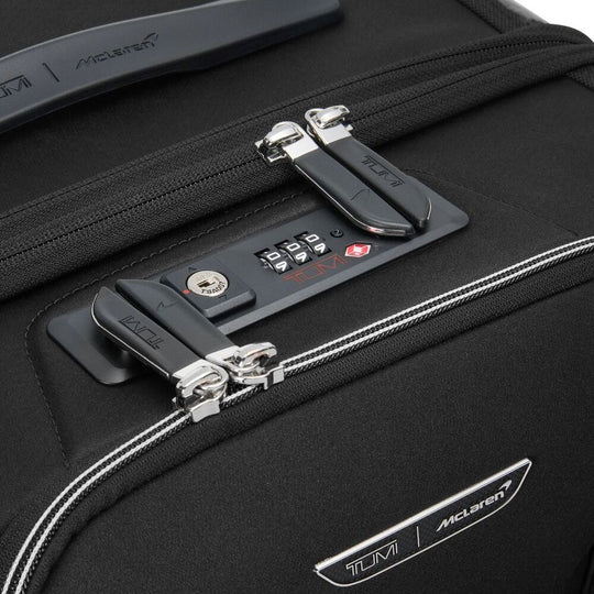 Close up of the combination lock on TUMI McLaren Aero Rolling Trunk Model number: 158999-A888