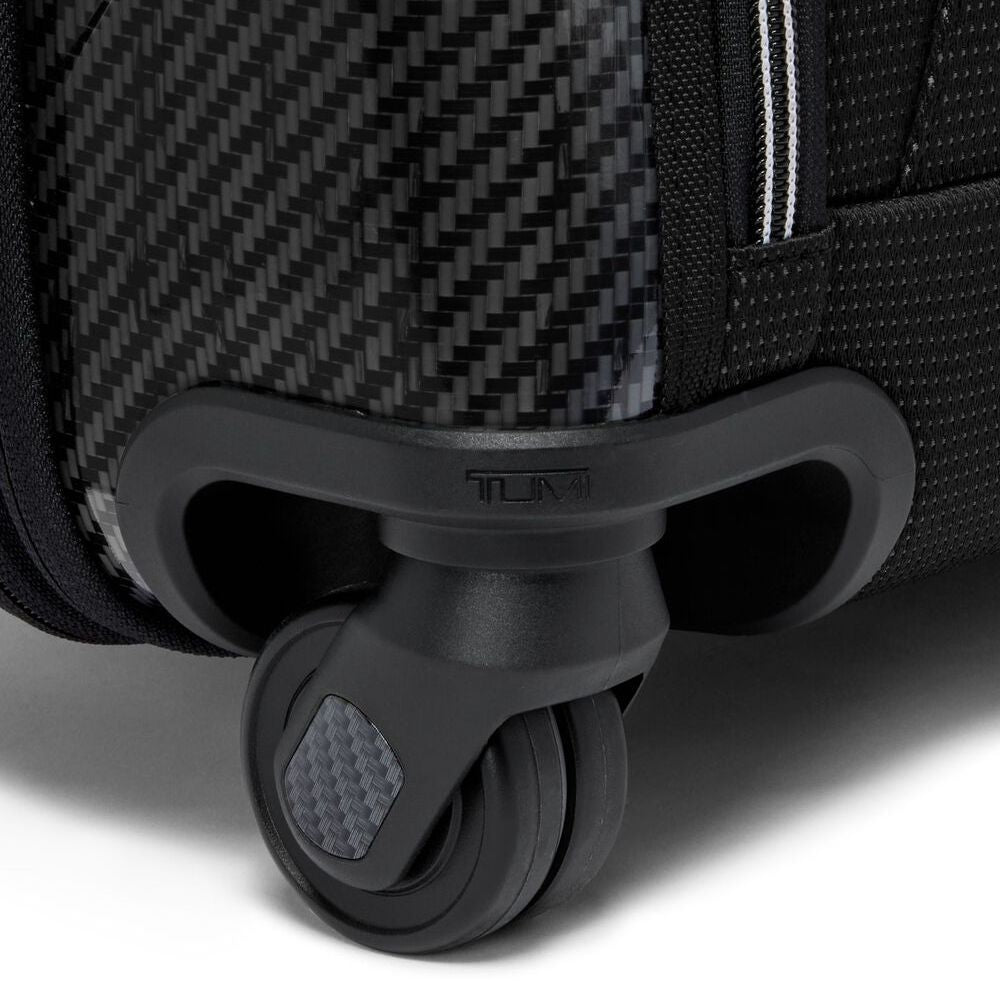 Close up of the wheel on TUMI McLaren Aero Rolling Trunk Model number: 158999-A888