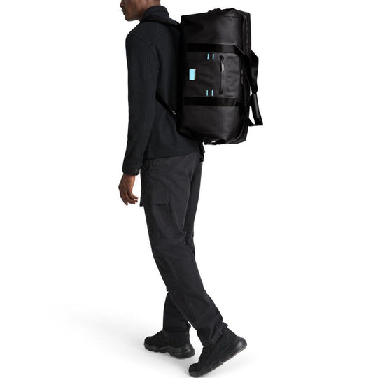 TUMI McLaren Rugged, Versatile, Convertible Throttle Duffel with Tuck-Away Backpack Straps, Welded Construction, Model 150214-1041