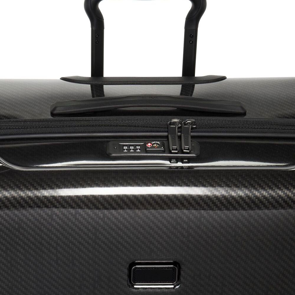 Close up of the handle and combination lock on TUMI Tegra-Lite Extended Packing Case With USB-C And Spinner Wheels: Model Number 144794-1060