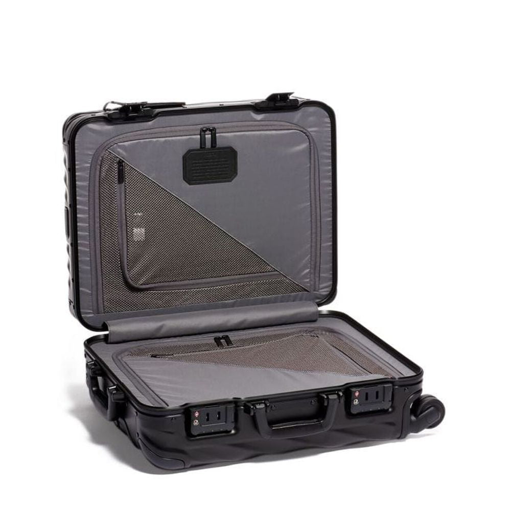 Black suitcase with open lid on a white background