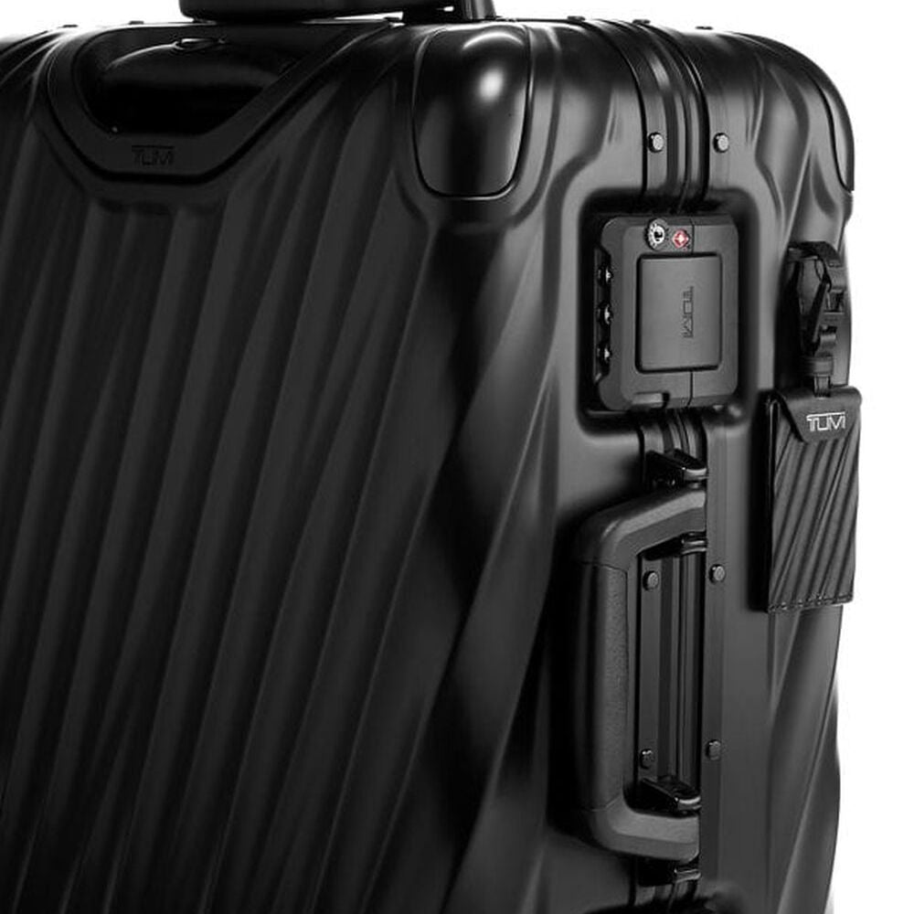 Close up of combination lock and handle of TUMI Durable 19 Degree Aluminum Carry-On 98820-1776 in Black