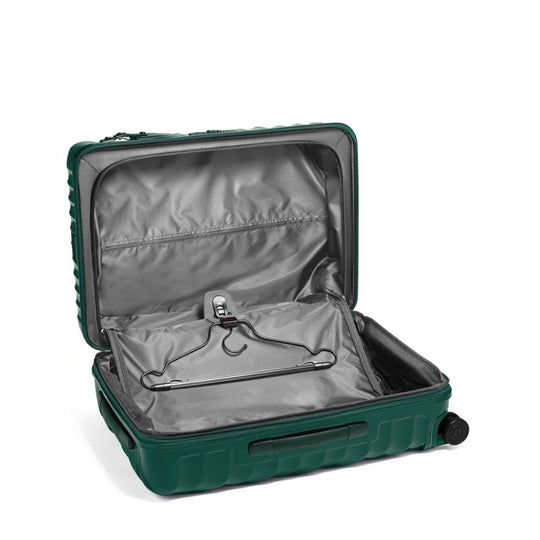 Green suitcase with open lid showing gray interior and hanger
