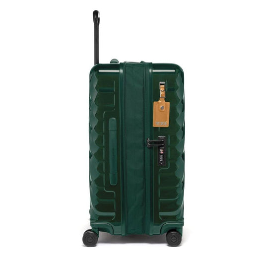 Green suitcase with a visible brand tag on a white background