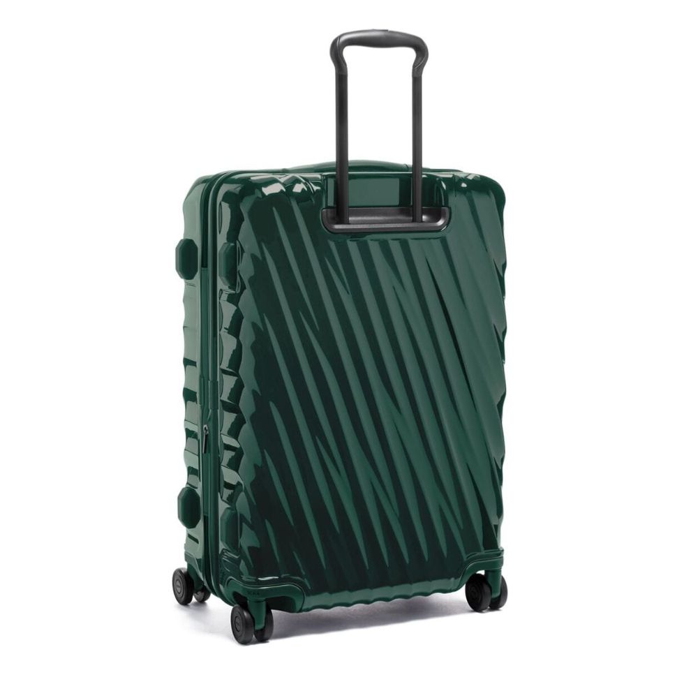 Green suitcase with a textured pattern on a white background