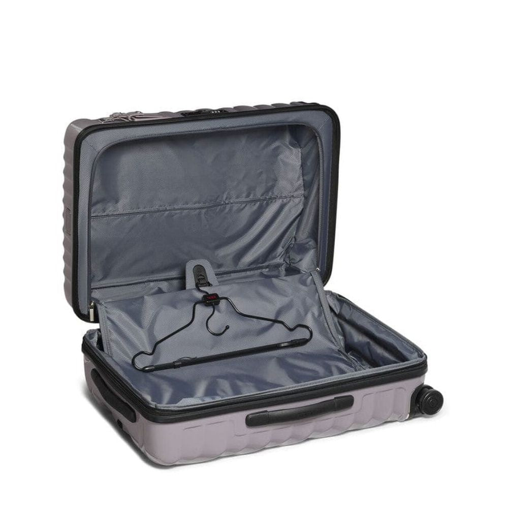 Open gray suitcase with a hanger inside on a white background