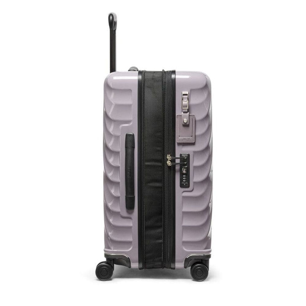 Lavender color TUMI 19 Degree Expandable Case 139685-1596 with black handle and wheels on a white background