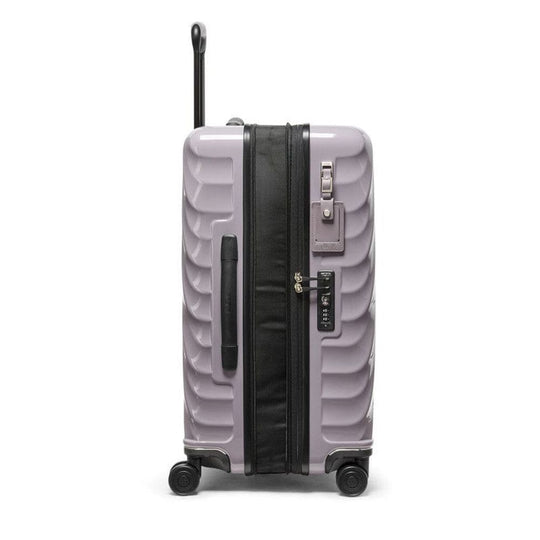 Lavender color TUMI 19 Degree Expandable Case 139685-1596 with black handle and wheels on a white background