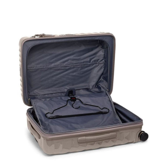 Open Moon Rock color TUMI 19 Degree Expandable Case with a hanger inside on a white background