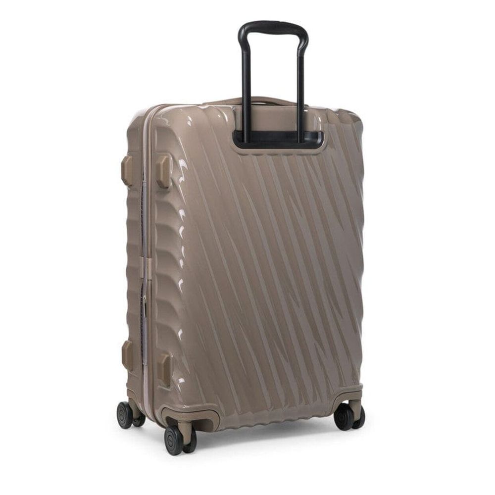 Moon Rock color TUMI 19 Degree Expandable Case with a black handle on a white background