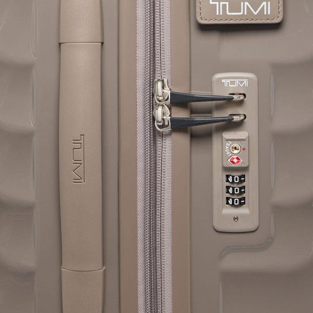 Close-up of combination lock on Moon Rock color TUMI 19 Degree Expandable Case 139685-1596