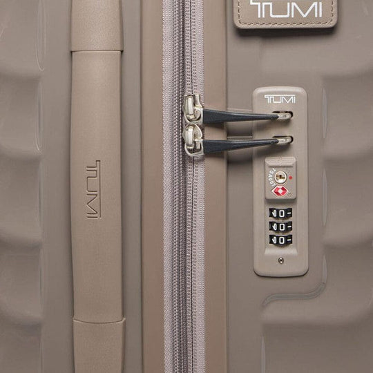 Close-up of combination lock on Moon Rock color TUMI 19 Degree Expandable Case 139685-1596