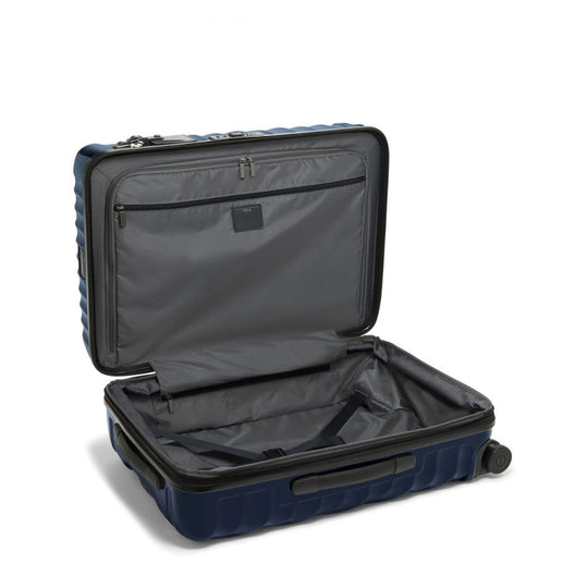 Navy blue TUMI 19 Degree Expandable Case on white background in open condition