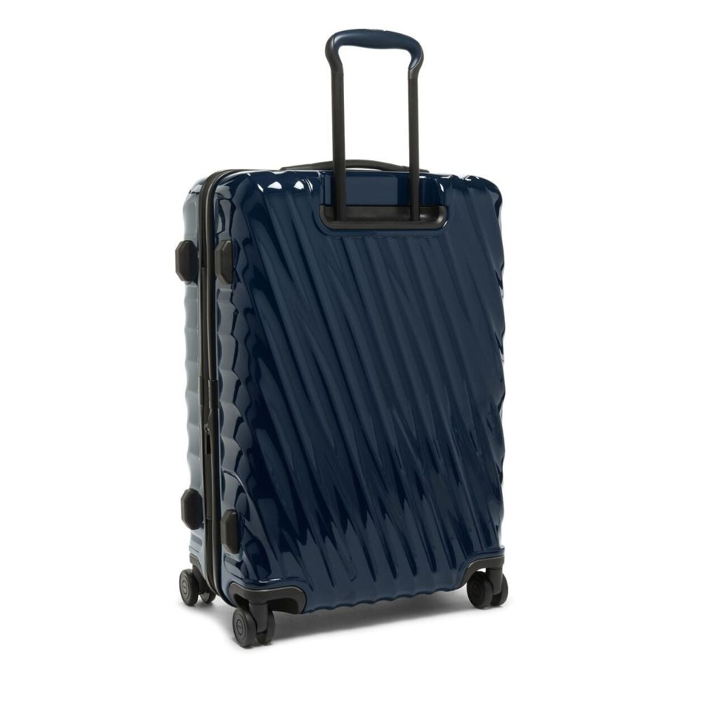 navy blue color TUMI 19 Degree Expandable Case with a black handle on a white background