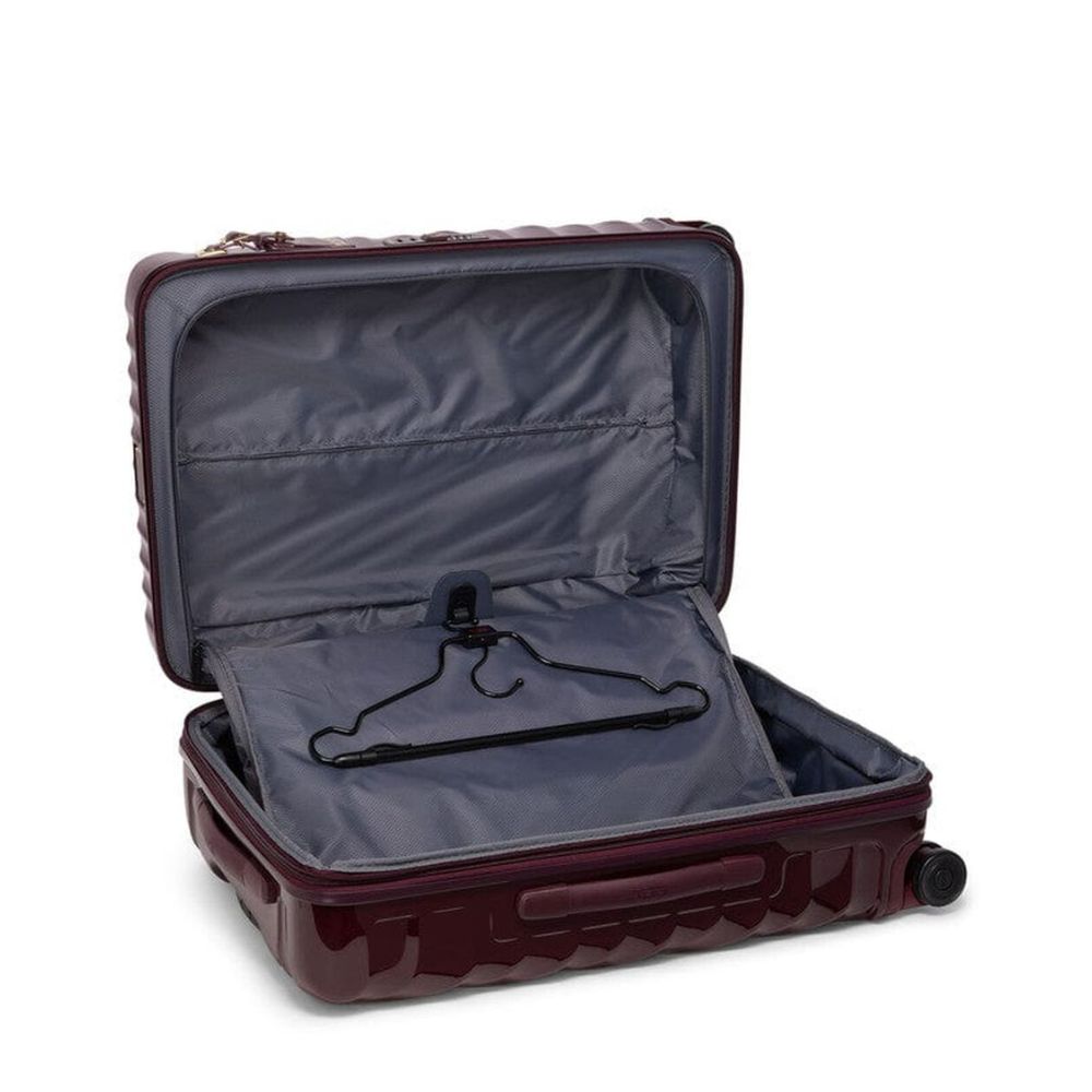 Open Wine color TUMI 19 Degree Expandable Case  with a hanger inside on a white background
