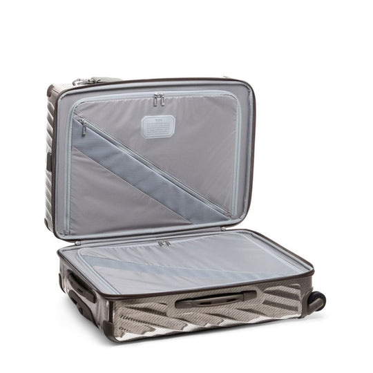 Open suitcase with clear interior on a white background