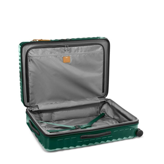 Green suitcase with open lid on a white background