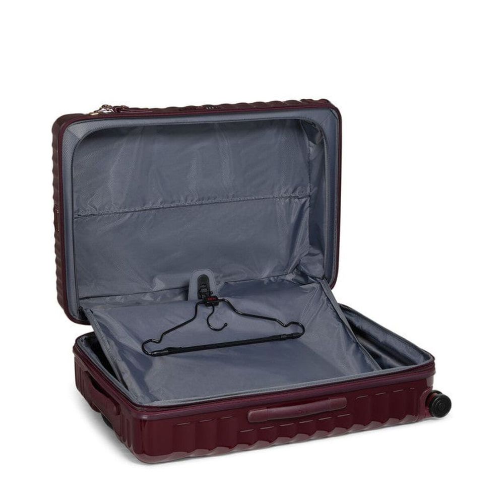 Open TUMI Alpha 3 Packing Case with gray interior on a white background