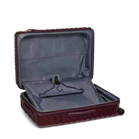 Open TUMI Alpha 3 Packing Case with gray interior on a white background