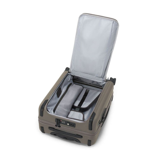 Open beige suitcase with interior on a white background