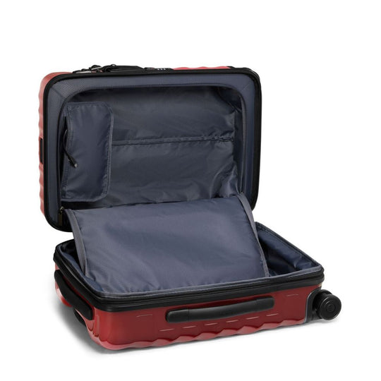 Red suitcase with open lid on a white background