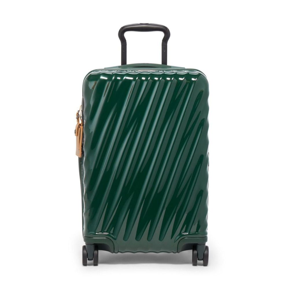 Green suitcase with a striped pattern on a white background